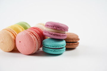 French macaron or macaroon  , colorful almond cookies, pastel colors, vintage card