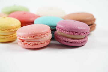 Fototapeta na wymiar French macaron or macaroon , colorful almond cookies, pastel colors, vintage card