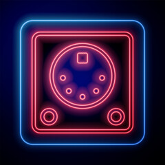 Glowing neon Drum machine icon isolated on black background. Musical equipment. Vector