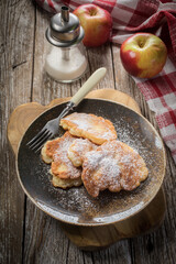 Homemade pancakes on a wooden table.