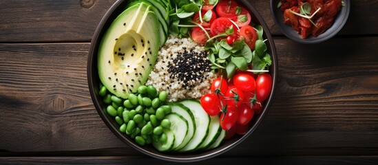 Recipe for a vegan, detoxifying green Buddha bowl featuring quinoa, avocado, cucumber, spinach,