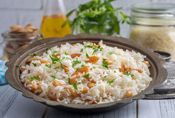 Traditional delicious Turkish food; Almond rice pilaf (Turkish name; Bademli pirinc pilavi)