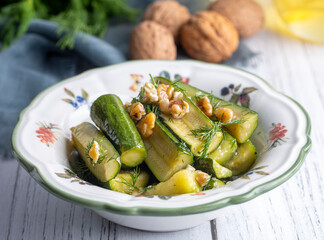 Green zucchini salad with walnuts and dill, Turkish appetizer - meze