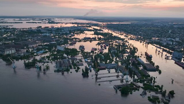 Top aerial view. The city of Kherson, Ukraine after the explosion on the Kakhovka dam. Flooded city and streets aerial view from above. Russian-Ukrainian war. 