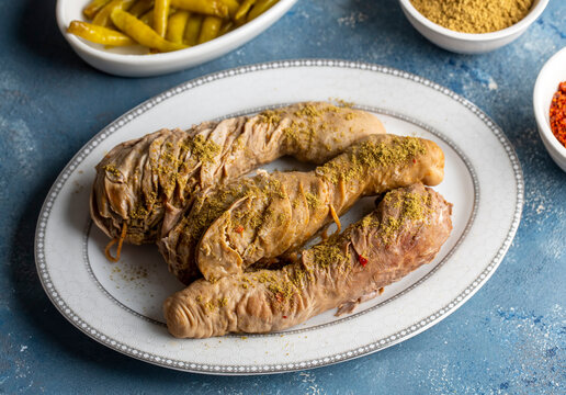 Traditional Turkish Stuffed rice tripe or offal food on the table in Turkish Restaurant. Shirdan Dolma is the favorite food Adana city of Turkey. (Turkish name; Sirdan)