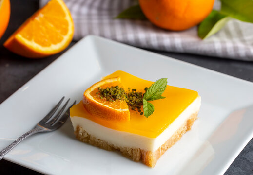 A delicious Turkish dessert; Etimek dessert with orange, orange cake, orange milk cake (Turkish name; Portakalli etimek tatlisi)
