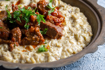 Turkish Food Hunkar Begendi made with Eggplant and Meat.