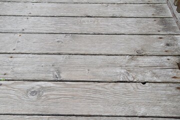 Fototapeta na wymiar exterior weathered wood walkway texture