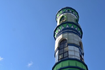 Mosque tower against the sky. Where the call to prayer echoed and also used for wide-viewing