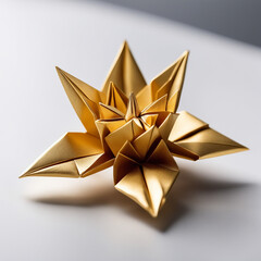 golden star origami on a white background