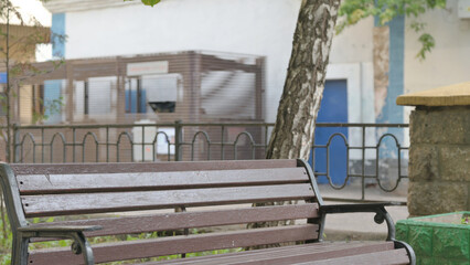 Young Man Standing up and Leaving Bench Outdoor