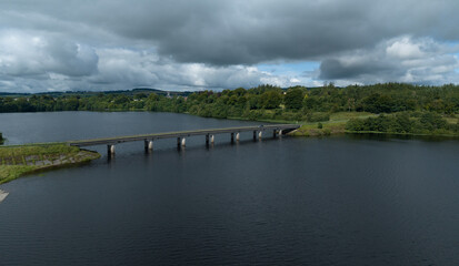 Fototapeta premium road bridge over blessing ton lake reservoir, county wicklow, ireland
