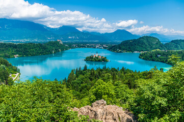 Fototapeta na wymiar A view from the Ojstrica viewpoint over Lake Bled and the village of Bled, Slovenia in summertime