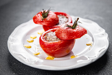 stuffed tomato meat filling tomatoes baked vegetable food healthy meal food snack on the table copy space food background rustic top view keto or paleo diet