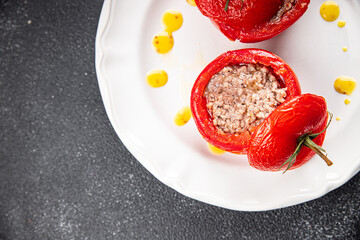 stuffed tomato meat filling tomatoes baked vegetable food healthy meal food snack on the table copy space food background rustic top view keto or paleo diet