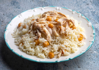 Traditional delicious Turkish food; Rice with chickpeas and chicken (Turkish name; Tavuklu nohutlu pilav or pilaf)