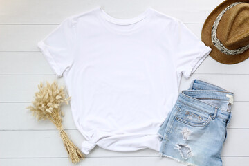 White women’s T-shirt mockup with jean and clothing accessories. Blank white t-shirt, t shirt...