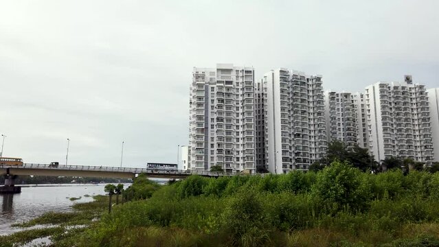 A Classic view of the Kochi Cityscape with high rise apartment buildings and the Highway bridge on the Arabian ocean in Kerala, India.
