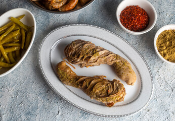 Traditional Turkish Stuffed rice tripe or offal food on the table in Turkish Restaurant. Shirdan Dolma is the favorite food Adana city of Turkey. (Turkish name; Sirdan)