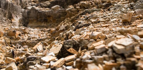 Scenic view of a rocky hill with an array of broken rocks scattered across