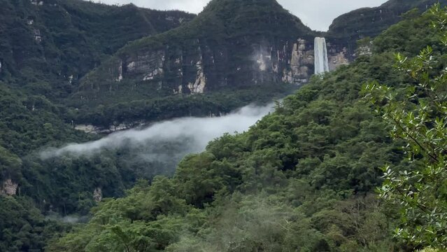 Beautiful flowing Gocta Waterfall in Peru on a sunny day