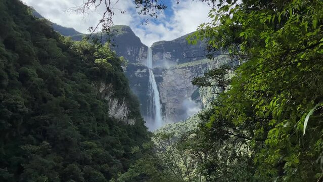 Beautiful flowing Gocta Waterfall in Peru on a sunny day