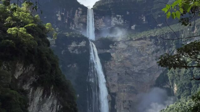 Beautiful flowing Gocta Waterfall in Peru on a sunny day