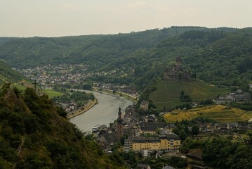 Fototapeta na wymiar Town of Cochem, at river Moselle, in Germany, on a summer's day. The famous Castle Reichsburg