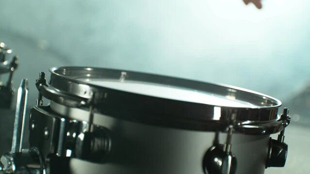 Super Slow Motion of  Drummer Banging on Drums. Filmed on High Speed Cinema Camera, 1000 fps.