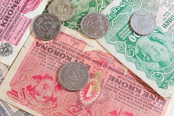 Closeup of Austrian and Hungarian coins from the early 1900s, including Heller, Filler, and Krone