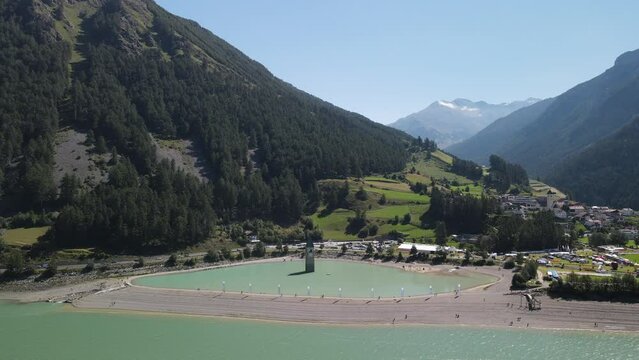 Lake Reschensee in Tirol with the sunken church tower