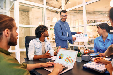 A group of young freelancers working in a coworking space