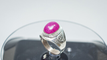 Ruby silver ring display on white background