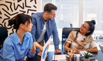 A group of young freelancers working in a coworking space