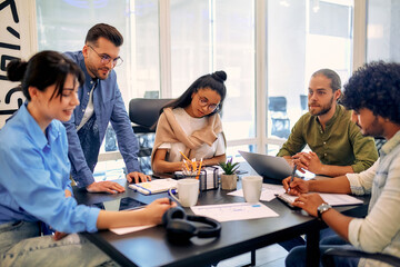 A group of young freelancers working in a coworking space