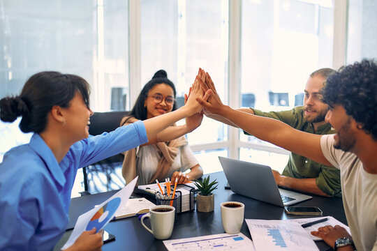 A group of young freelancers working in a coworking space