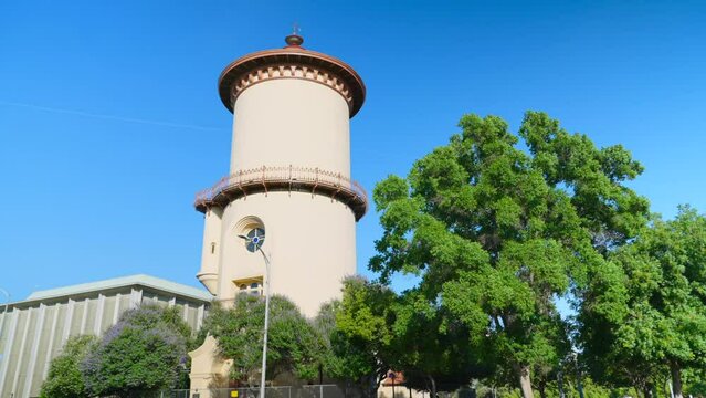 FAC Water Tower in Fresno against the blue sunny sky
