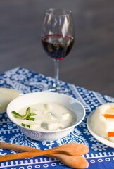 Freshly prepared Georgian traditional Gebjalia accompanied with red wine