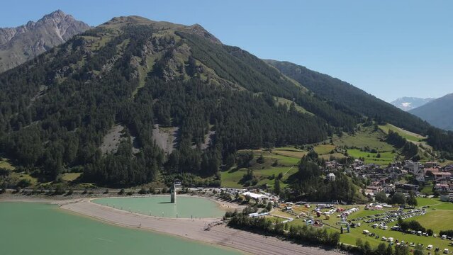 Lake Reschensee in Tirol with the sunken church tower