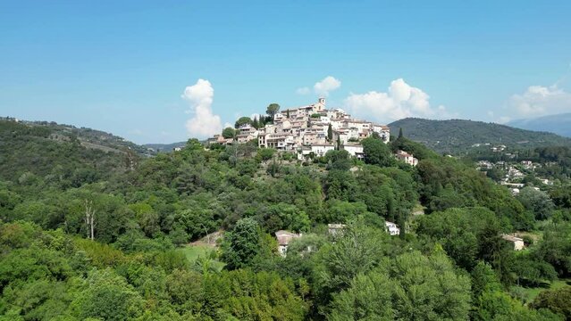 Aerial of the beautiful old Bussi sul Tirino commune in Italy surrounded by green trees