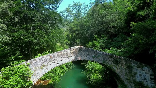 Drone footage over the stone bridge of Pont Des Tuves, Hiking area in Montauroux, France