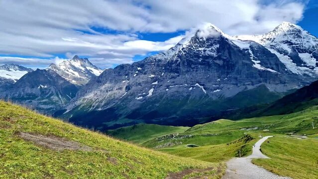 amazing Swiss nature . Kleine Scheidegg mountain pass that runs between the famous Eiger and the Lauberhorn famous for hiking in Bernese Alps. Switzerland travel