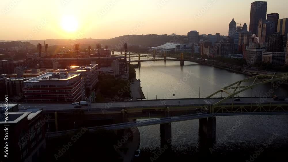 Poster drone shot of west end overlook park with west end bridge at sunset golden hour