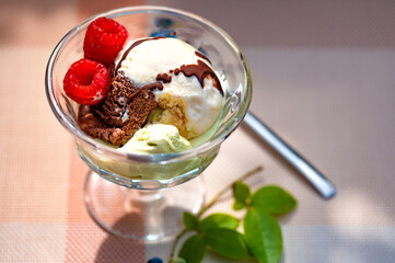 Melting ice cream in glass cup