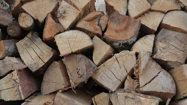 pile stack of firewood chopped wood stacked up ready for winter