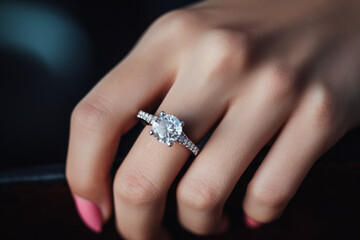 Woman hand with engagement ring. Close up. High quality photo