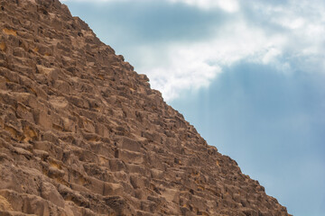 The Sphinx of Giza next to the Pyramids in the desert, Egypt in Asia