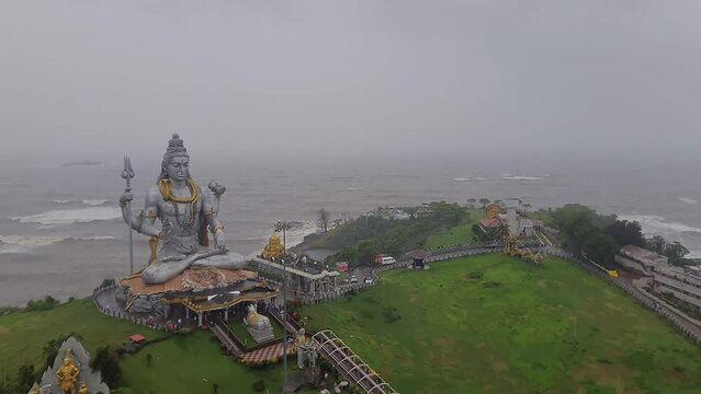 The world's tallest Lord Shiva statue in the drizzling rain at the seaside