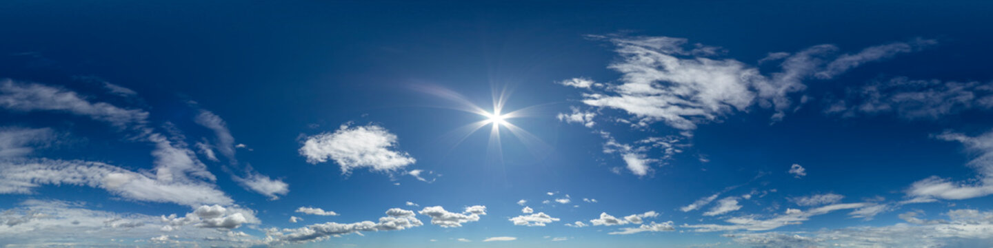 360 VR 2:1 equirectangular blue sky with clouds background overlay. Ideal for 360 VR sky replacement. High quality 300 dpi, adobe rgb color profile