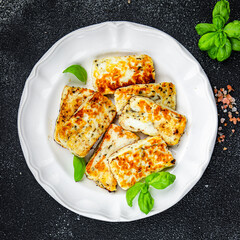 fried cheese halloumi basil meal food snack on the table copy space food background rustic top view